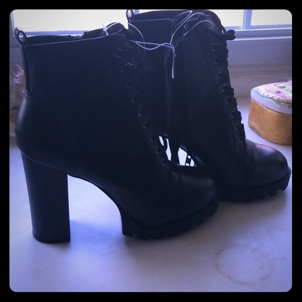 black combat looking heeled boots